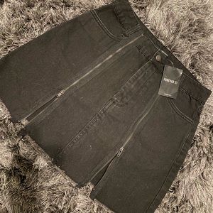 Black zippered denim skirt